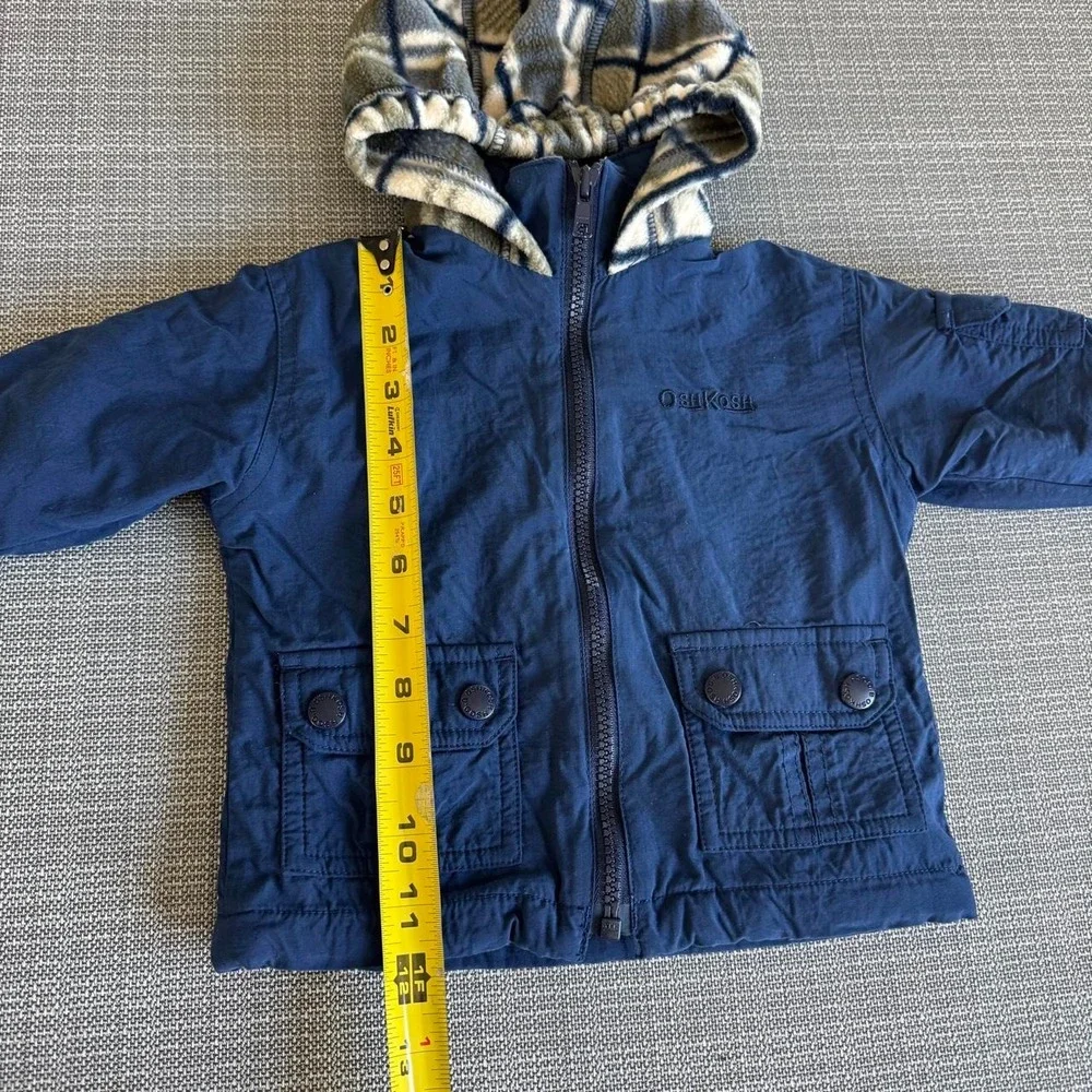 OshKosh B'gosh navy blue kids jacket with hood.
